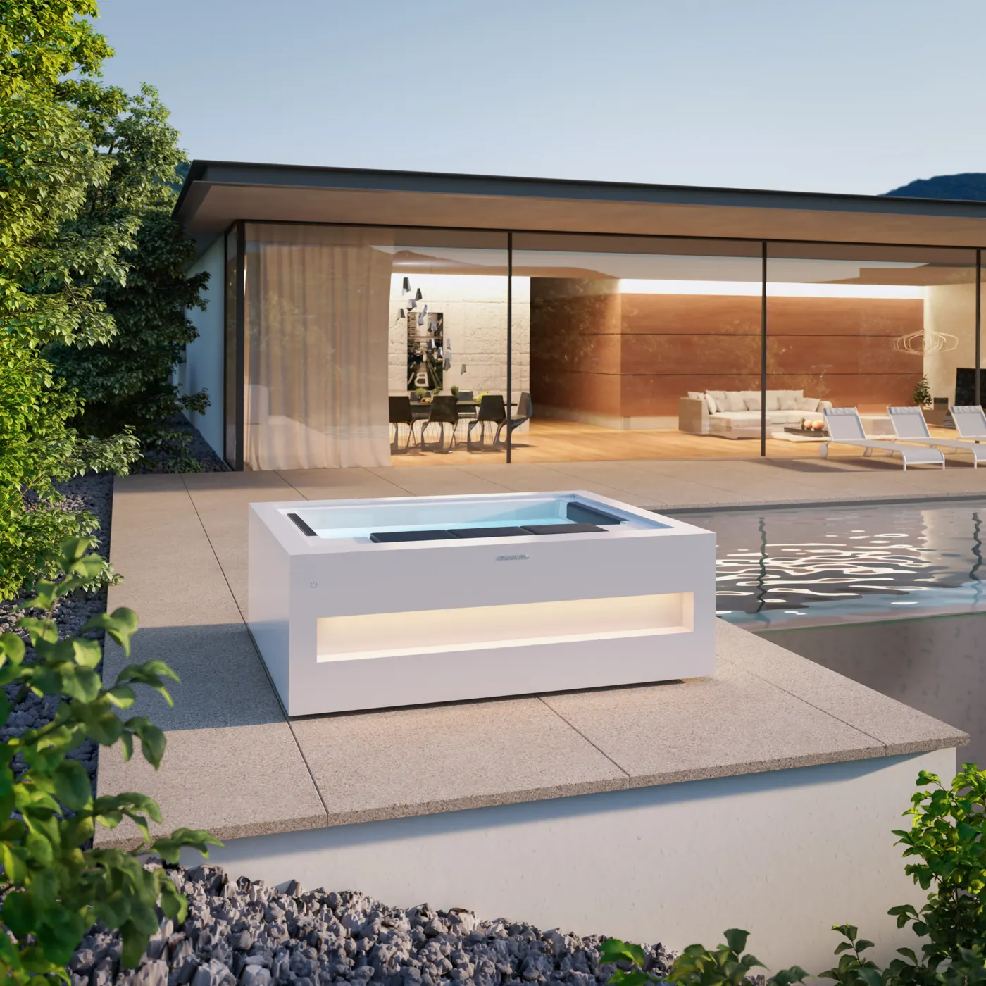 Aquavia Home en Solid Surface devant une maison de verre